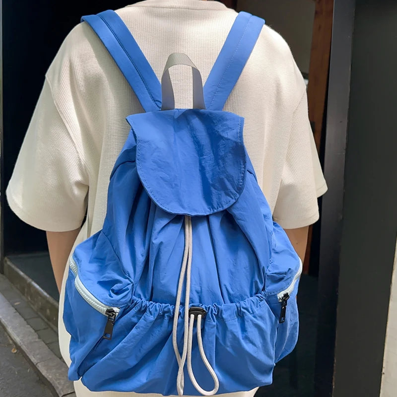 Men's folding backpack, suitable for hiking, traveling, and outdoor exploration, with large capacity for easy storage