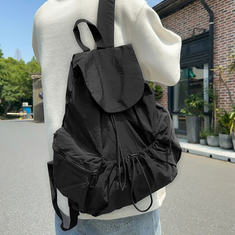 Men's folding backpack, suitable for hiking, traveling, and outdoor exploration, with large capacity for easy storage