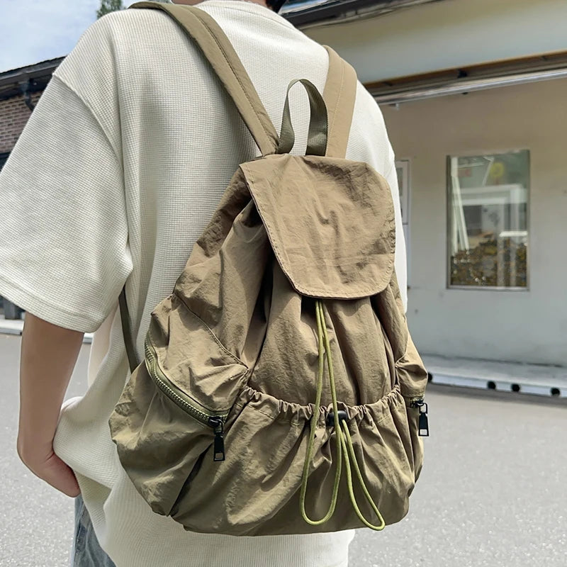 Men's folding backpack, suitable for hiking, traveling, and outdoor exploration, with large capacity for easy storage